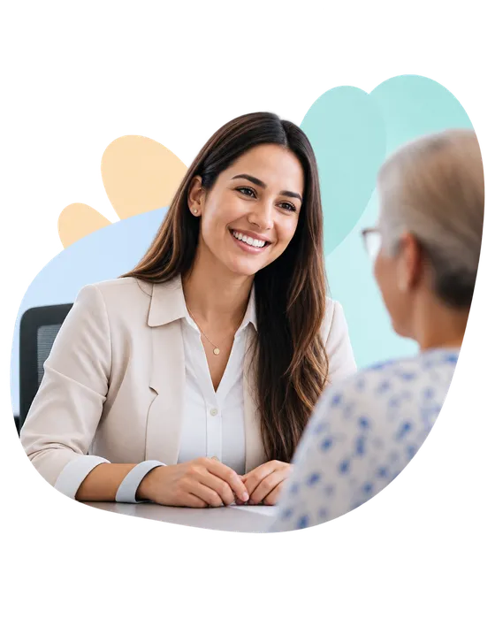 An Ideal Insurance agent going over coverage options with a customer